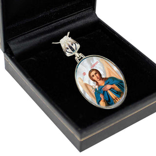 a pendant with a religious symbol, such as a saint or angel, displayed in a black box.
