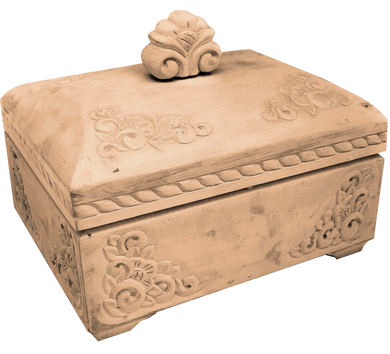 a wooden box with intricate carvings and a decorative top.