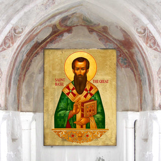 a religious icon of Saint Basil, a bearded man wearing a green robe and holding a book, set against an ornate archway.