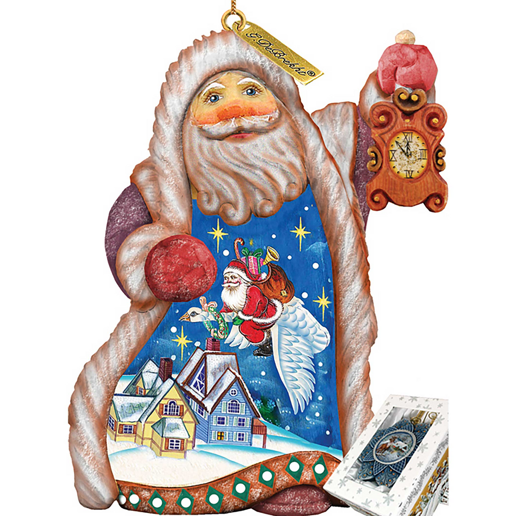 A colorful ornament depicting Santa Claus flying over a snowy village, holding a clock and a bird.