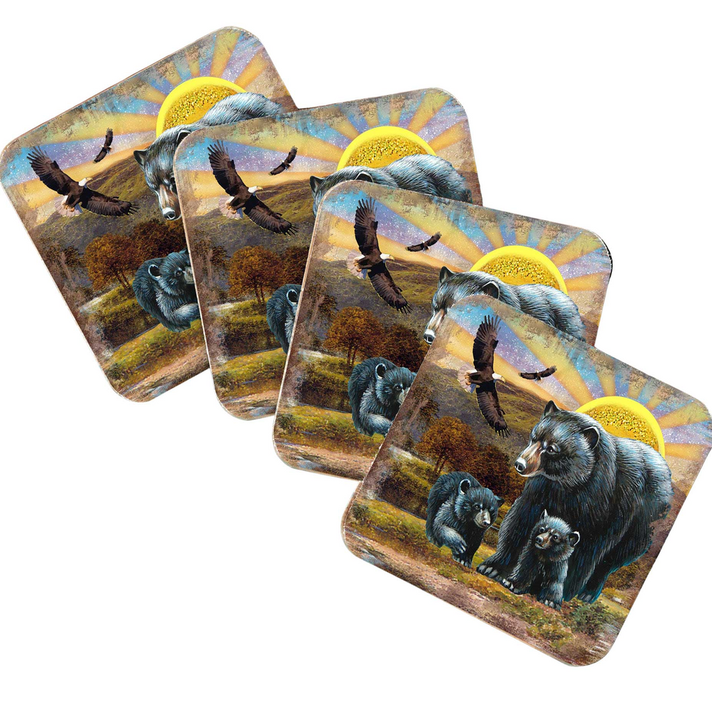 A set of four coasters featuring images of bears and birds in a natural setting, including a bear and two birds flying in the sky.