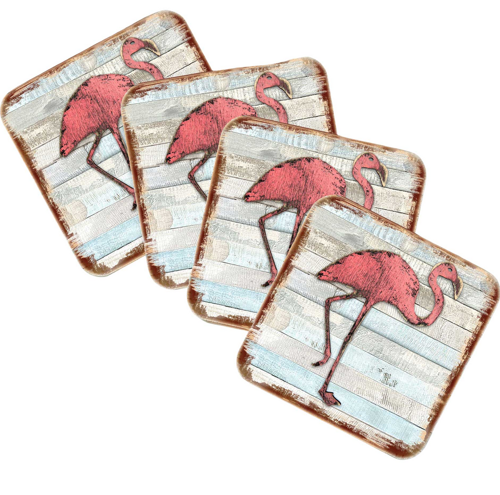 four square coasters with a pink flamingo design on them.