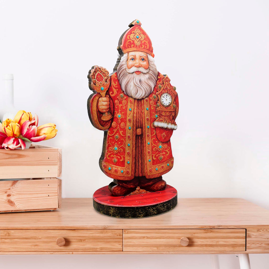 A wooden table with a decorative Santa Claus figurine on top.