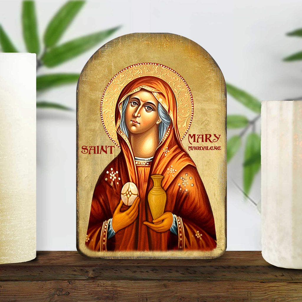 a religious icon of Saint Mary of the Flower, with a golden halo around her head and a vase in her hands.
