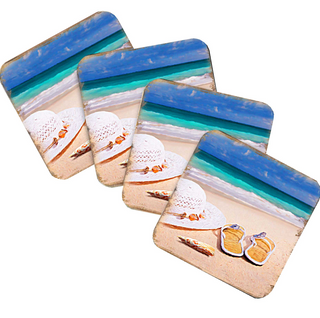 A set of four coasters featuring beach scenes with white hats, sandals, and the ocean.