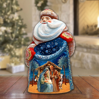 Santa Claus figurine with a nativity scene on its belly