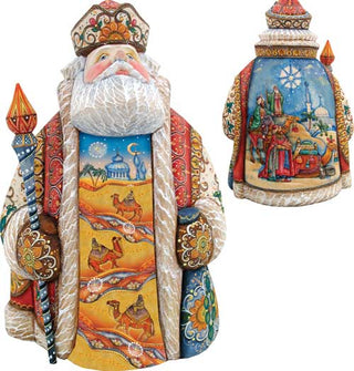 two colorful, intricately designed figurines of Santa Claus. The figurines are adorned with detailed patterns and illustrations, showcasing the festive and traditional nature of Santa's character.