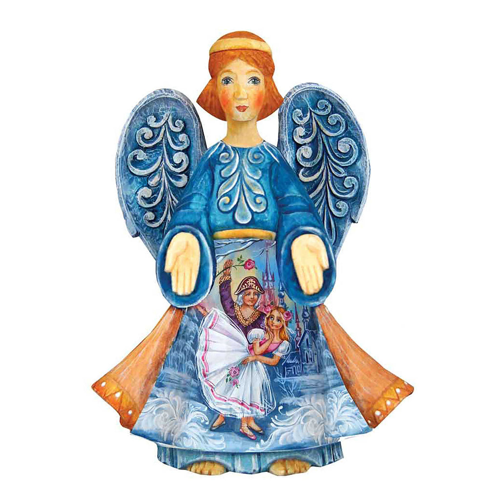 A blue and white painted angel figurine with intricate designs and patterns, including a scene of a woman and a child.