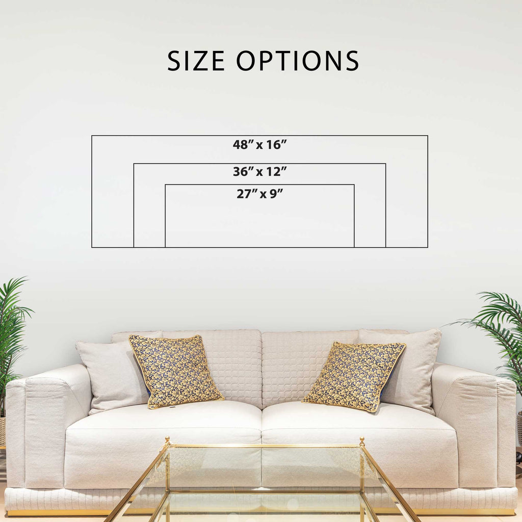 a living room with a white sofa and a glass coffee table. Above the sofa, there is a wall with a size chart indicating the dimensions of the sofa in inches.