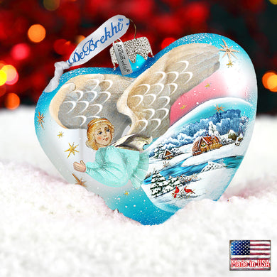 a heart shaped ornament with an angel on it
