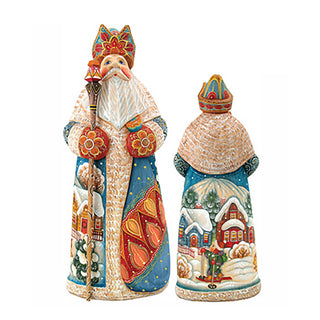 two colorful, intricately designed figurines of Santa Claus, one standing upright and the other sitting down, both adorned with detailed patterns and designs.