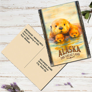 A postcard featuring an image of three otters, with the text 