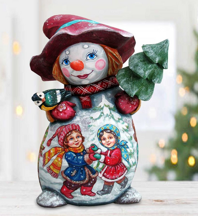 A colorful figurine of a snowman, featuring a smiling face, a hat, and a scarf, holding a small bird and a tree.