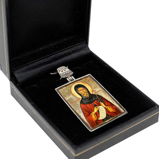 a religious icon, possibly a religious symbol or deity, displayed in a black box.