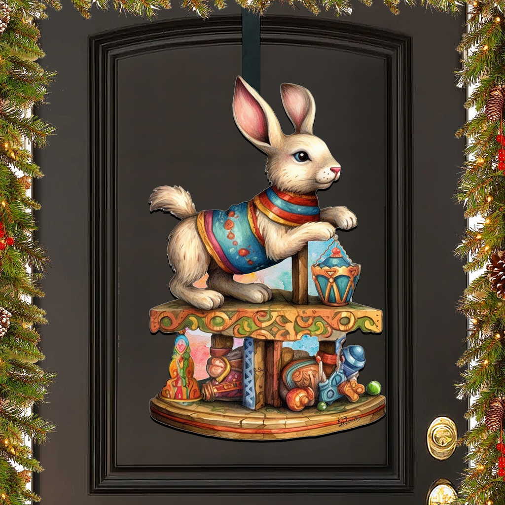 A colorful illustration of a rabbit sitting on a carousel, surrounded by various decorative elements such as a Christmas wreath.