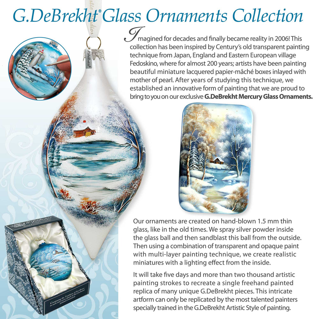 a glass ornament with a snowy scene on it