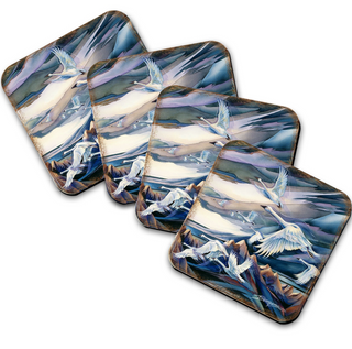 a series of square coasters with a repeating pattern of birds in flight against a mountainous landscape.