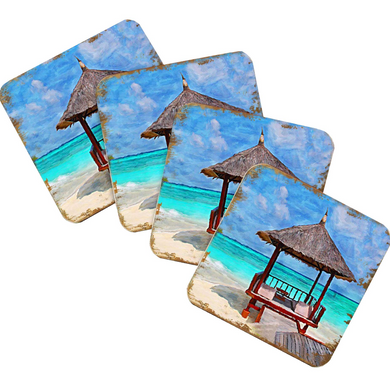 A set of four coasters featuring beach scenes with thatched umbrellas and benches.
